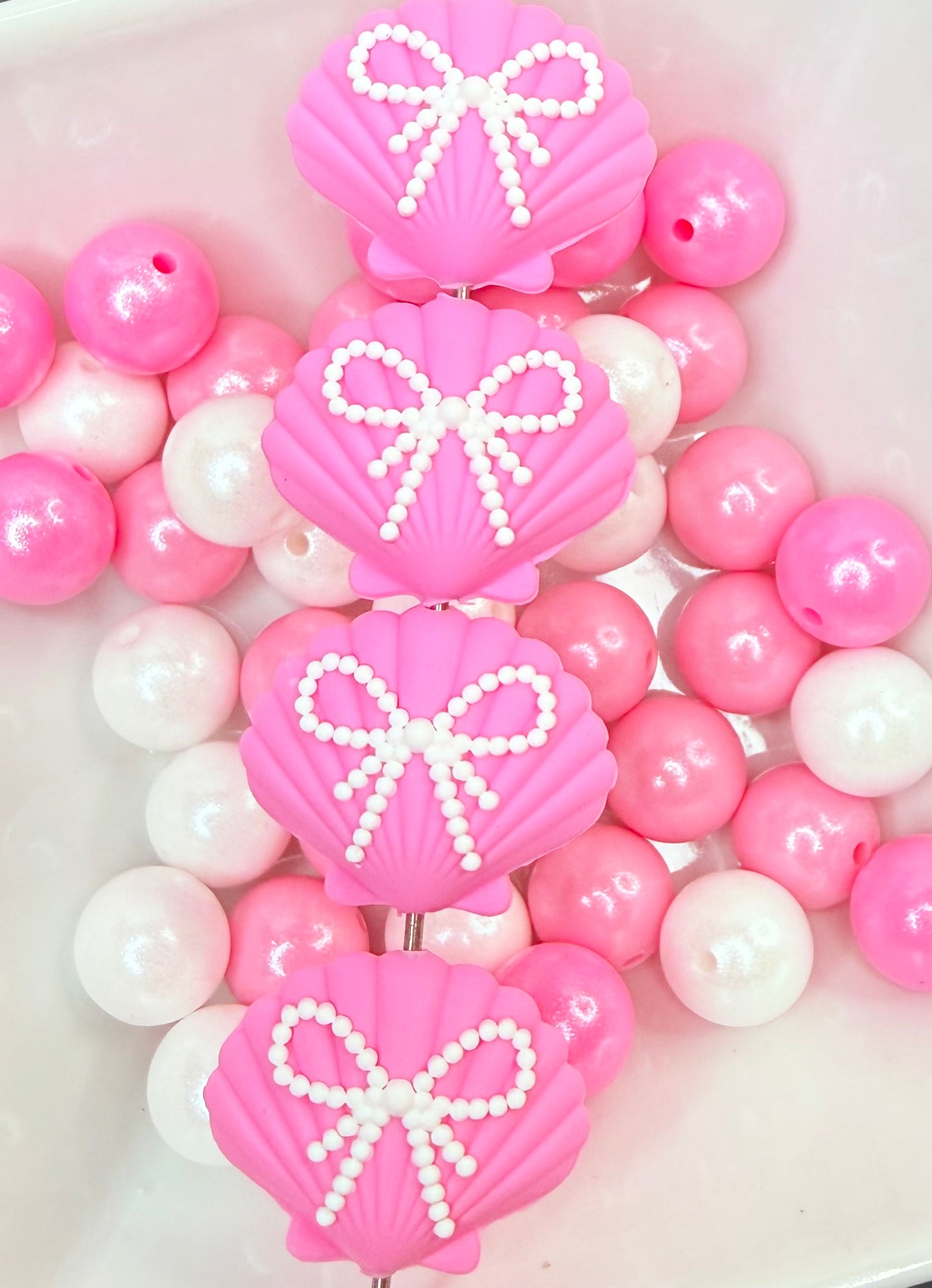 Pink shell and bow focal