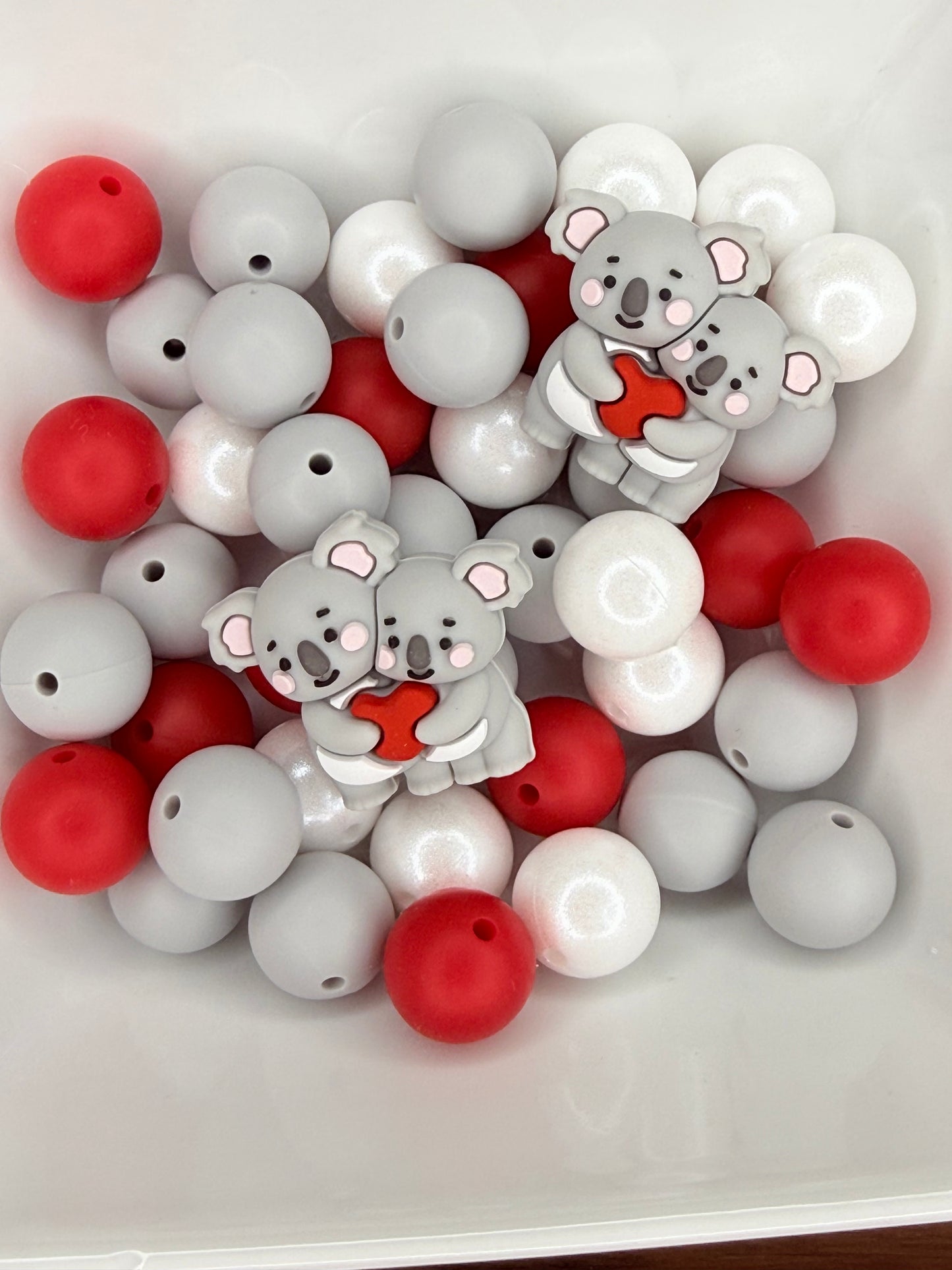 Light grey koala heart focal