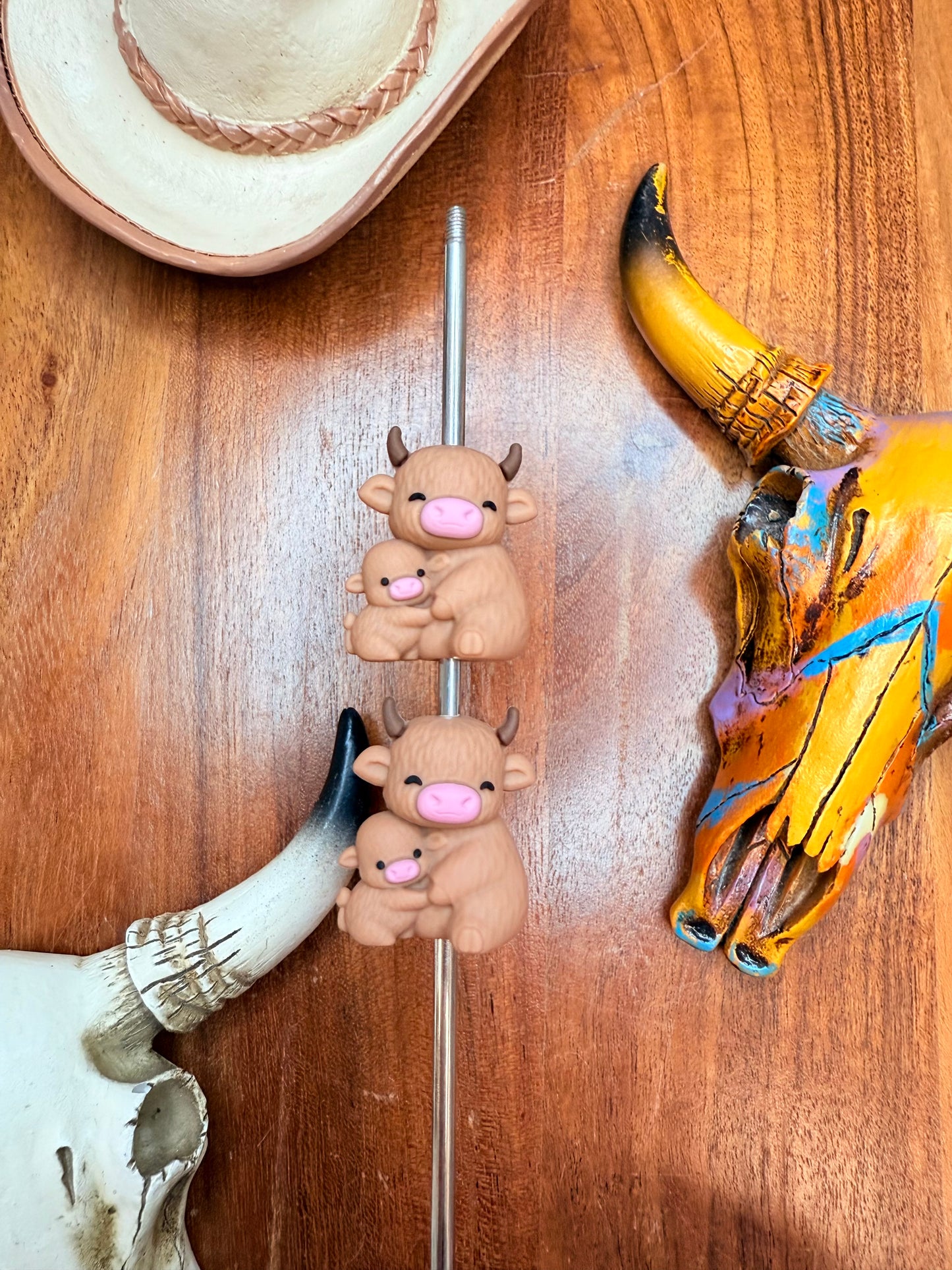 3D brown Mama and baby cow focal