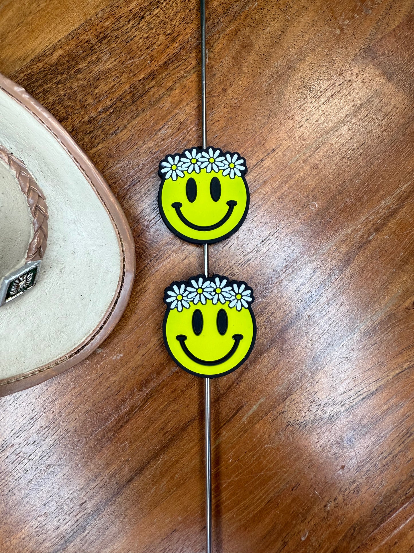 Yellow smiley with daisy focal