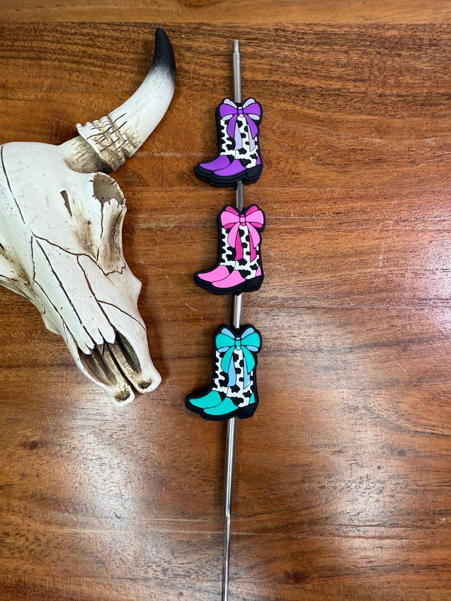 Cowprint boots with bow focal