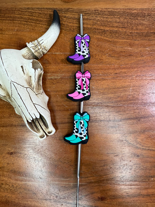 Cowprint boots with bow focal